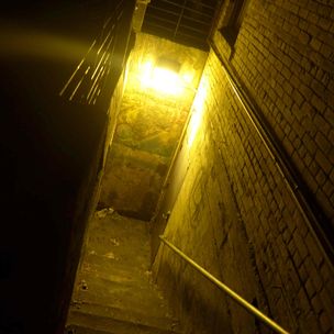 'Stairs Behind Sledsters' by Zack Schuster